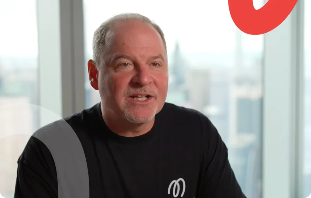 Illustration or photo of Matt Blumberg, CEO of Markup AI, in an AI tech interview setting.