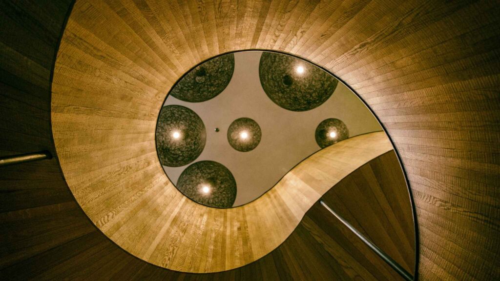 curved architecture and lights to reference brand consistency.