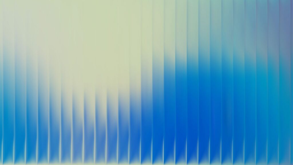 Abstract image with vertical, blurred lines transitioning from pale green at the top to vibrant blue at the bottom, creating a gradient effect with a soft, wave-like pattern across the image.